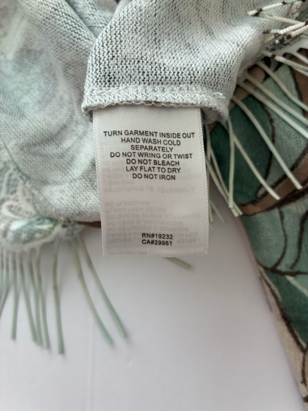 Alfred Dunner Boho Embellished Green and Brown Swirl Patterned Fringe Hem Blouse - Picture 7 of 9